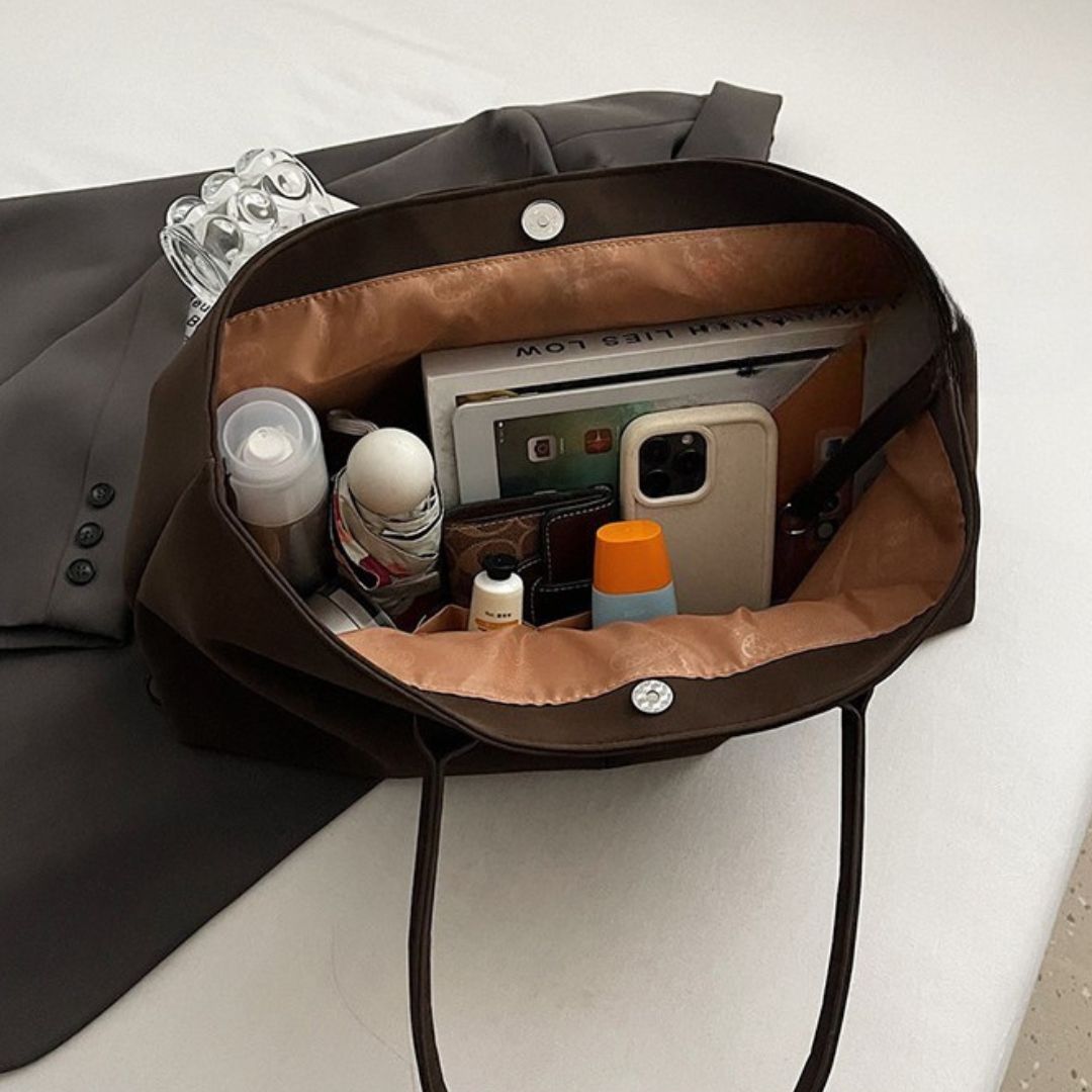 EVA – Bolso bandolera de moda fabricado en ante sintético.