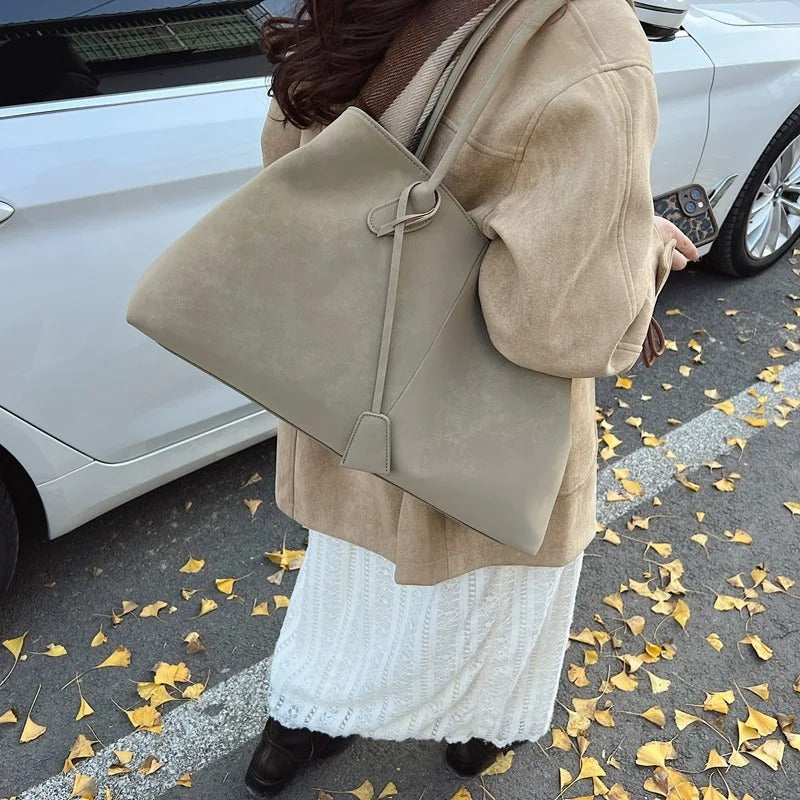 EVA – Bolso bandolera de moda fabricado en ante sintético.